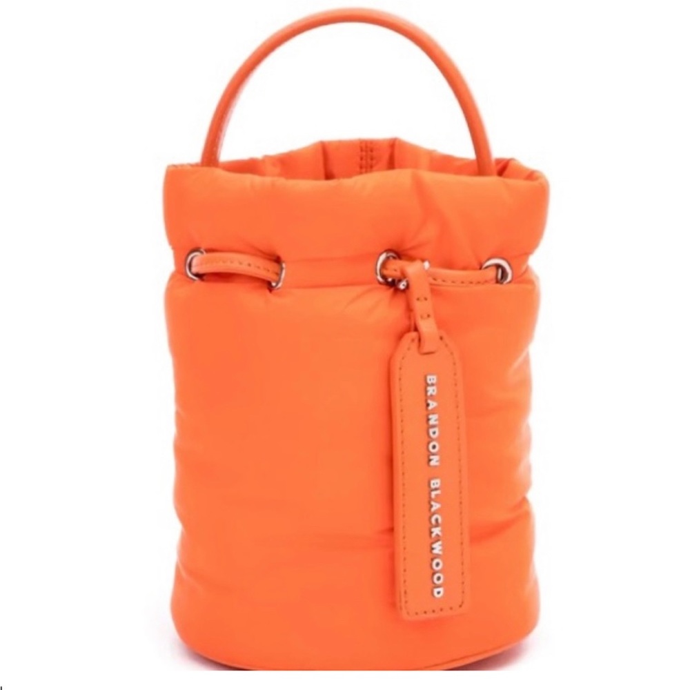 Brandon Blackwood “Kamal” puffer bucket bag in orange